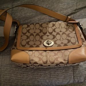 Tan and brown coach purse. Used slightly in great condition!
